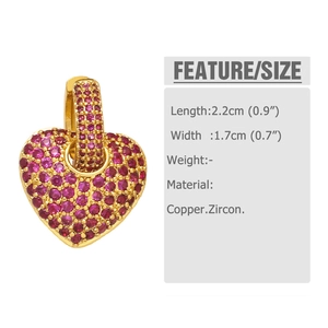 Detail view of gold heart earring with purple zircons and product dimensions