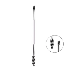 Dual-head eyebrow brush with angled bristles and spiral spoolie for precise grooming