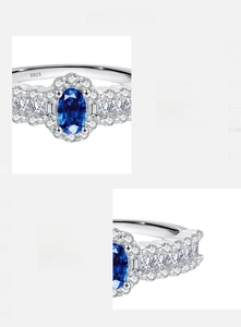 Macro detail of S925 sterling silver ring with blue oval zircon and S925 hallmark