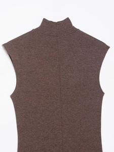 Detail view of dark brown high-neck sleeveless knit vest showing fabric texture