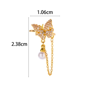 Detail view of butterfly ear cuff with micro-paved zircons and a hanging pearl charm