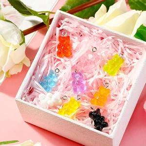 Colorful resin bear pendants with silver rings in a pink gift box for DIY jewelry making
