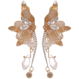 Elegant gold butterfly wing earrings with freshwater pearls and tassels on white background