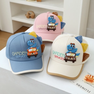 Detailed view of kids' cotton baseball caps with 3D silicone dinosaur and embroidery