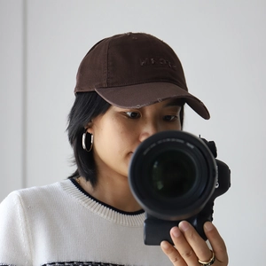 Distressed brown cotton baseball cap with VROTE embroidery for a vintage aesthetic style