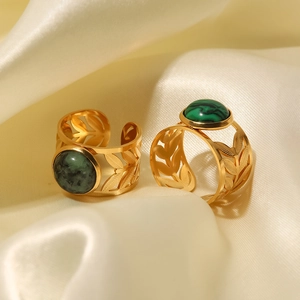 18K gold plated stainless steel hollow leaf rings with round green turquoise on silk