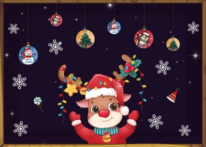 Detail of Christmas window clings with reindeer, penguins, and snowflakes on blue background