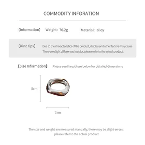 Size guide for irregular metal bangle showing 8cm height, 7cm width and 76.2g weight details