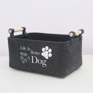 Deep grey felt pet toy storage bin with wooden handles and printed dog quote