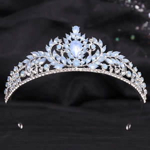 Detail of silver crown with light blue gemstones and fine marquise crystal accents