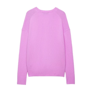 Pink soft knit long sleeve sweater with ribbed cuffs and hem shown from the back