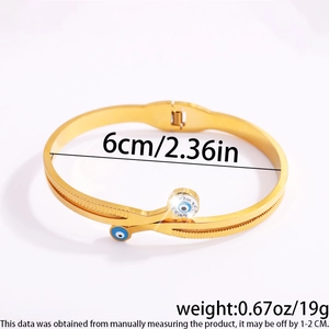 Detail showing 18K gold stainless steel evil eye bangle with 6cm diameter measurements