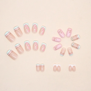Sweet light blue and pink press-on nails set with rhinestones and glitter heart designs