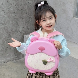Pink cartoon bear 3D hard shell school backpack for preschool kids worn by a girl