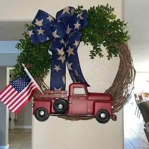 Detail of USA Independence Day grapevine wreath with vintage red truck and star bow