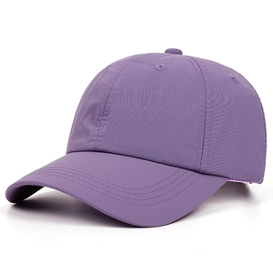 Detailed side view of a purple baseball cap with reinforced stitching and breathable eyelets