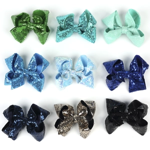 Set of 9 large 5-inch sequin hair bow clips in various colors for girls' hair styling