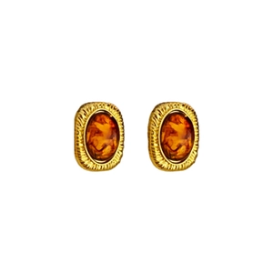 Retro amber resin earrings with golden gear borders shown as a symmetrical pair