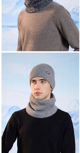 Detail of grey winter knit hat and neck warmer with fleece lining and DK logo patch