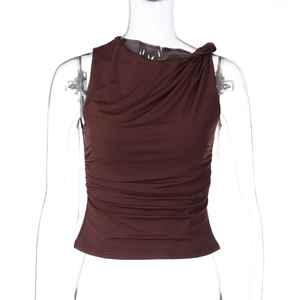 Detailed close-up of dark brown ruched sleeveless top with asymmetrical knotted neckline