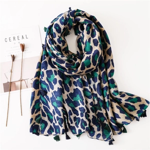 Lightweight cotton linen long scarf with blue leopard print and tassel edges
