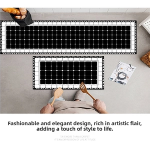 Kitchen mat set with black and white grid patterns in a modern home decor setting