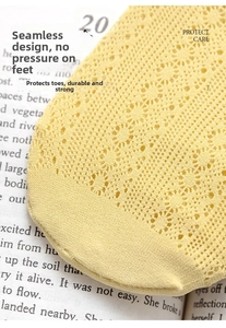 Detailed macro view of yellow mesh socks featuring seamless toe stitching for comfort