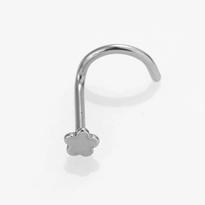 Detailed view of silver flower-shaped stainless steel L-shaped nose stud piercing