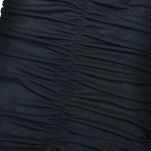 Detail shot of navy blue ruched mesh fabric showing elastic texture and stitching craftsmanship
