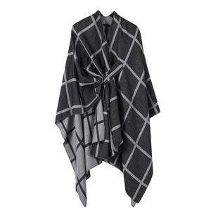 Women's plaid poncho in black and grey soft knit fabric with a front knot detail