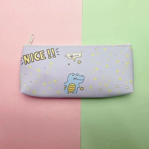 Close-up of lavender PU pencil case with cute blue dinosaur print and NICE text