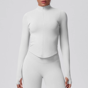 Close-up of seamless ribbed grey sports jacket featuring stand collar and thumbhole cuffs