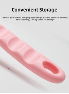 Pink silicone bath brush handle with ergonomic wavy finger grooves and hanging hole