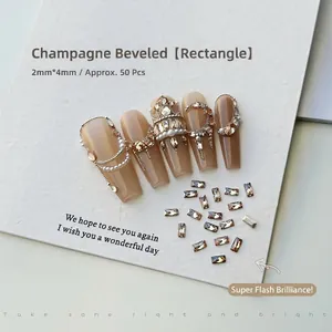 Macro shot of 2x4mm champagne rectangle rhinestones on gradient press-on nails
