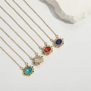 Luxurious gold oval birthstone necklace set featuring colorful crystal pendant stones