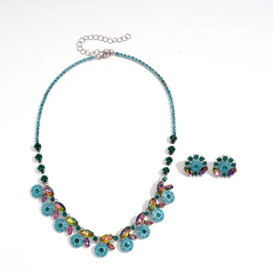 Vintage geometric flower jewelry set with blue and green crystals on a silver chain