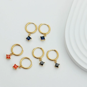 Elegant gold stainless steel hoop earrings featuring red, blue, and black square zircon drops