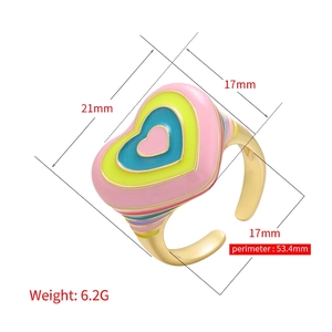 Adjustable gold open ring featuring a colorful rainbow enamel heart and striped details