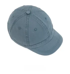 Detailed view of the blue-grey short-brim baseball cap with reinforced stitching lines
