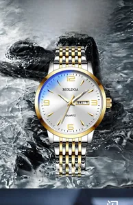 Men's quartz watch with date display splashing in water on rocks showing waterproof feature
