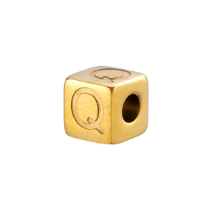 Macro view of a 14K gold-plated stainless steel cube bead featuring an engraved letter Q