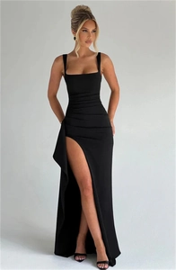 Detail of elegant black evening dress featuring square neck and side high slit design