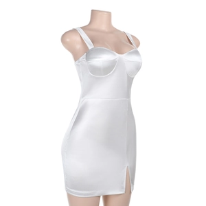 Detail view of the side slit and satin texture on a white bodycon mini dress