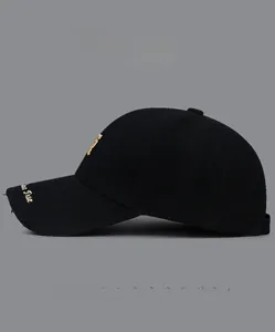Close-up of distressed brim details on black cotton baseball cap with color options