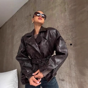 Fashionable dark brown faux leather biker jacket with waist belt for women in retro style
