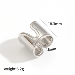 Macro shot of stainless steel ring showing 18.3mm width and 6.2g weight details