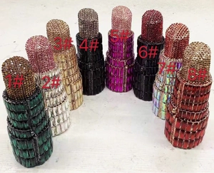 Lipstick shaped evening clutch bags featuring colorful rhinestones in eight vibrant shades