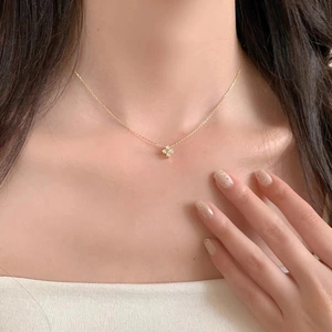 Elegant S925 sterling silver four-leaf clover necklace with 14K gold plating and zircons
