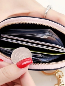 Pink and black mini coin purse with multi-card slots and secure metal zipper closure