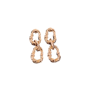 Vintage golden textured oval hoop earrings with silver pins for elegant fashion style